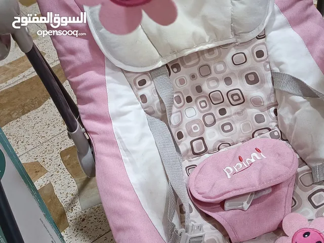 كرسي متحرك كهربائي او هزاز للاطفال..