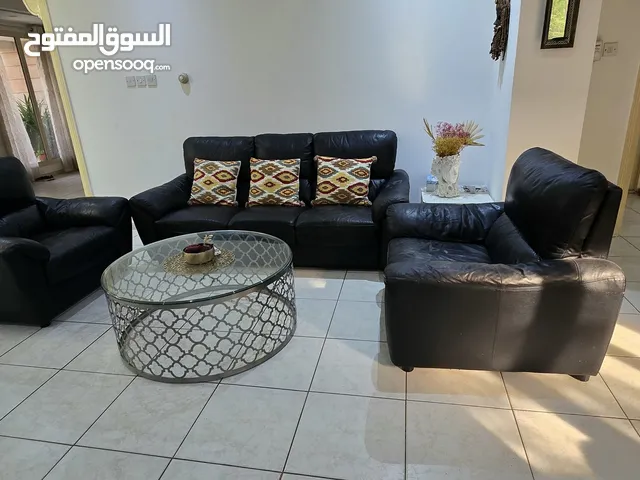 used Black leather sofa for sale - in good condition