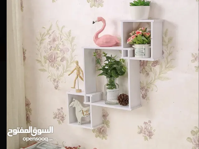رف تخزين الاغراض والتحف للمنزل والهدايا والأدوات المنزلية المختلفة