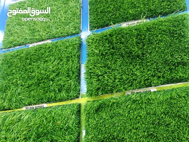 سجادة باللون الأخضر مع التثبيت