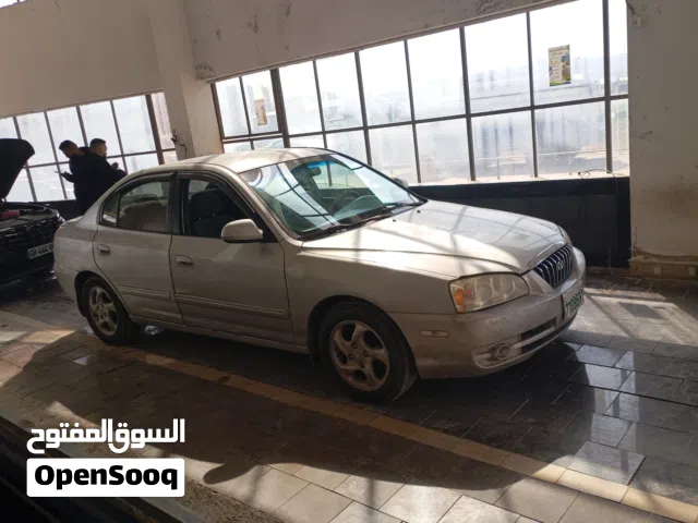 ضوء خلفي عدد 2 وسلف وطرمبة بنزين وماتور رافع شابيك ومسطرة بخاخات عدد 4 واربع كويلات وغطاء صباب