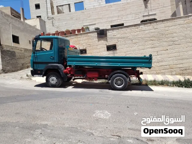 نقل جميع انواع مواد بناء /ناعمه /عدسيه /رمل صويلح /طمم /طوب /اسمنت /حجر /تراب احمر