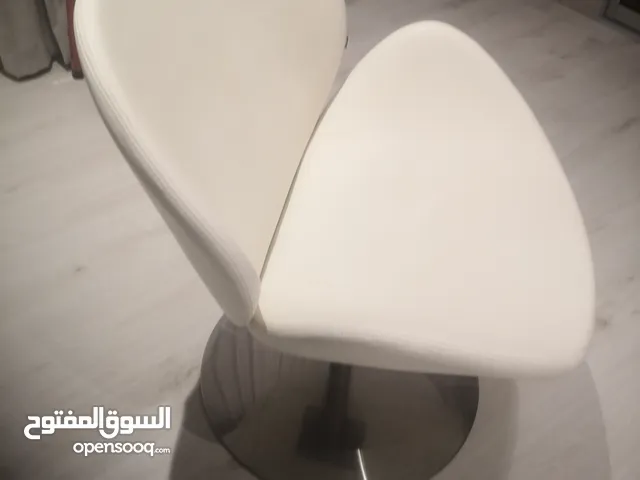 كرسي جلد دوار