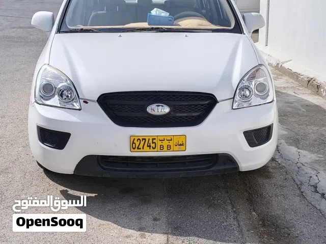 2009 كيا كارينز Standard