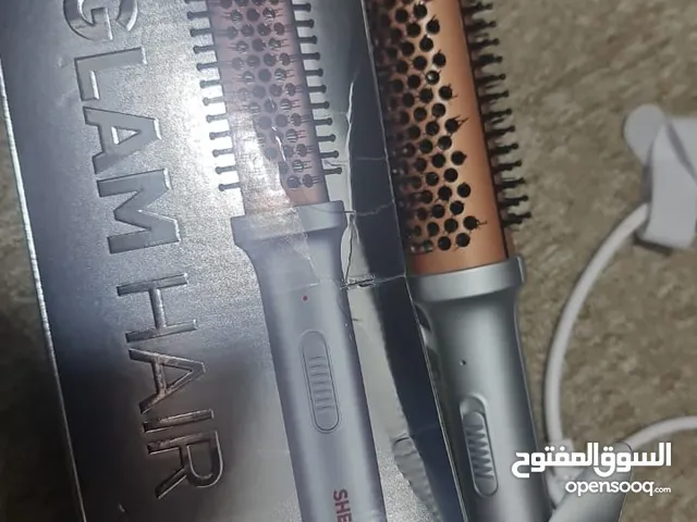 جهازين تصفيف شعر ماركة فيليبس وماركة شي جلام بحالة ممتازة وجديدة تم استعمالهم بشكل بسيط للبيع