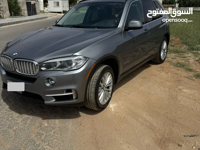 BMW X5 Model 2016 Plug-in 23750 دينار فحص كامل، كاملة الاضافات.