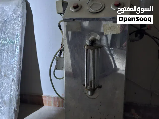 مكواة بخار مع طاولة كوي