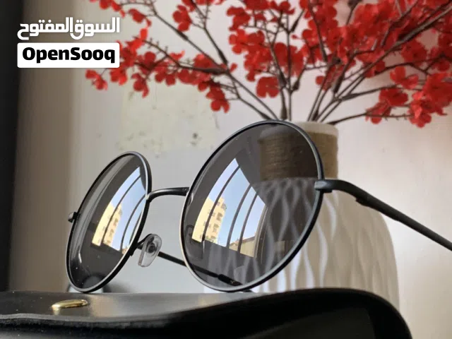 نظارة شمسية بعدسات دائرية وإطار ناعم وأنيق