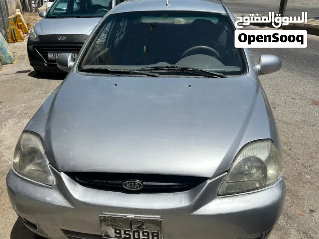 2004 كيا ريو Standard
