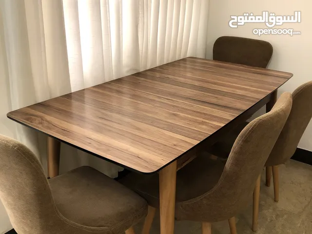 ميز طعام تركي من الخشب الزان بطاوله متحركه قابله للتكبير والتصغير مكون من 6 كراسي