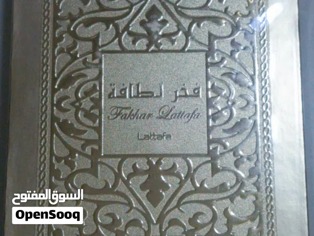 طقم عطور فخر لطافة الأصلي (فخر الذهبي للرجال + فخر الأبيض للنساء) - 100 مل