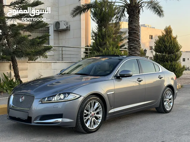 JAGUAR XF 2014 ( مخزنة )وارد الوكالة فل كامل ممشى قليل ( 15) الف كم