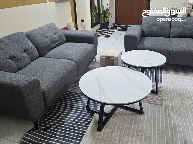 Comfortable Gray Sofa with stylish coffee table