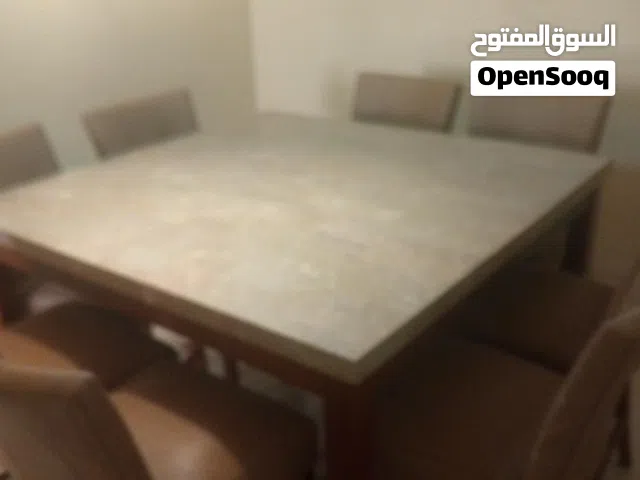 طاولة طعام 8 كراسي