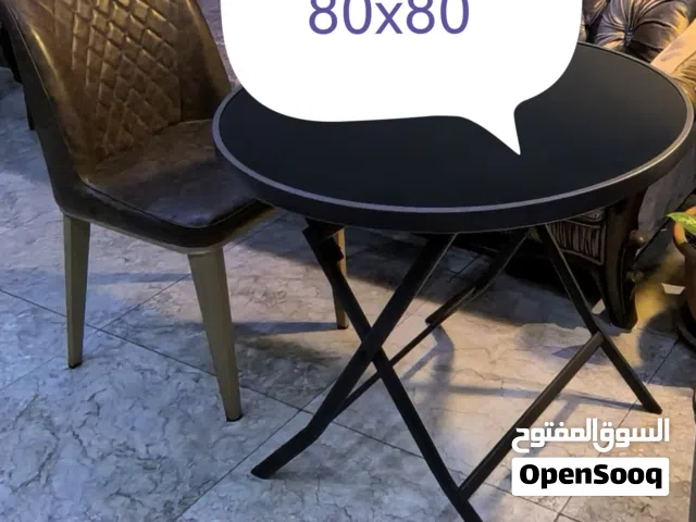 ميز و اربع كراسي
