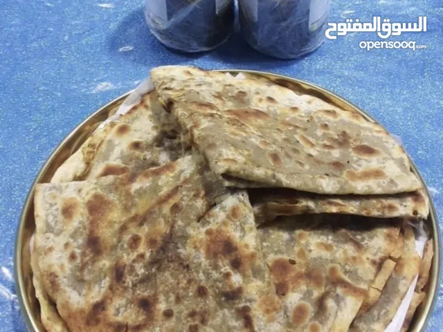 طعام خبز صاج بالمهياوة بالزبدة او زيت زيتون او دهن عداني 25حبة خبز صاج مهياوة ماعون واجار ثوم يبل