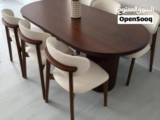 طاولات طعام عصرية بتصميم أنيق وجودة عالية تضيف لمسة فخامة لمنزلك