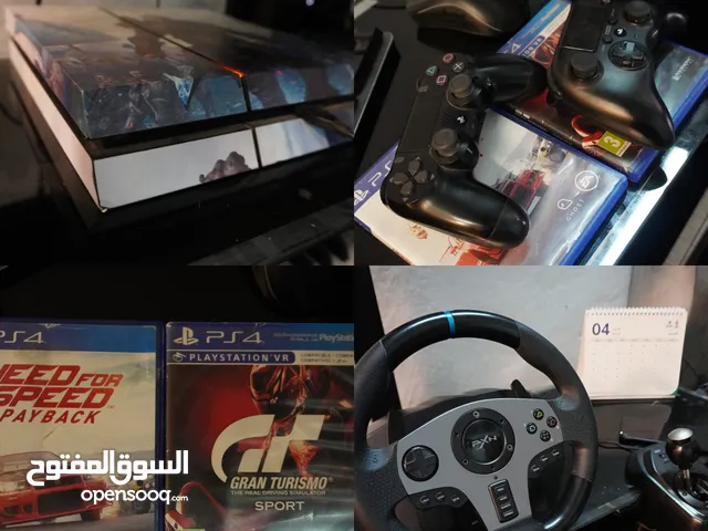 PLAYSTATION 4 WITH PXN V9 STEERING WHEEL, 2 GAMES 2 CONTROLLERS. Mint condition