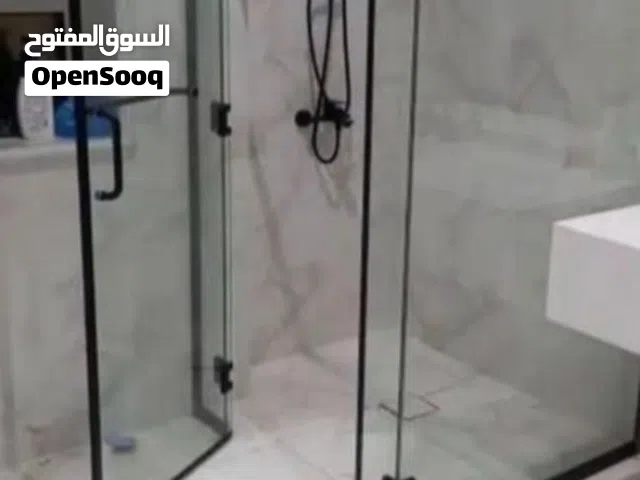 فني تركيب زجاج سكريت ابواب زجاج مرايات شاورات صيانة