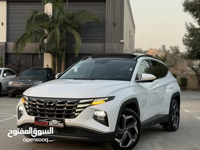 هونداي توسان ترخيص 2022 محرك 1600 هايبرد plug in/يقطع على الشحنه 65 كيلو متر  271 حصان