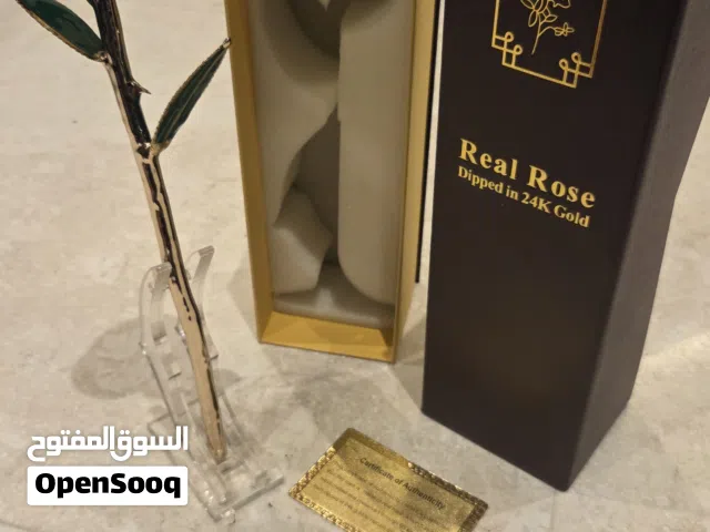 وردة طبيعية مطلية بذهب عيار 24