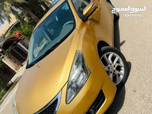 نيسان تيدا 2015 ذهبي