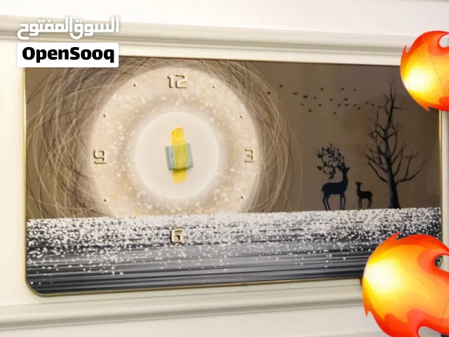 ساعه حائط مع تصميم انيق