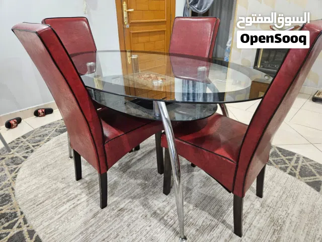 طاولة طعام مودرن مع 4 كراسي جلد   Glass Dinning Table with Lather chairs