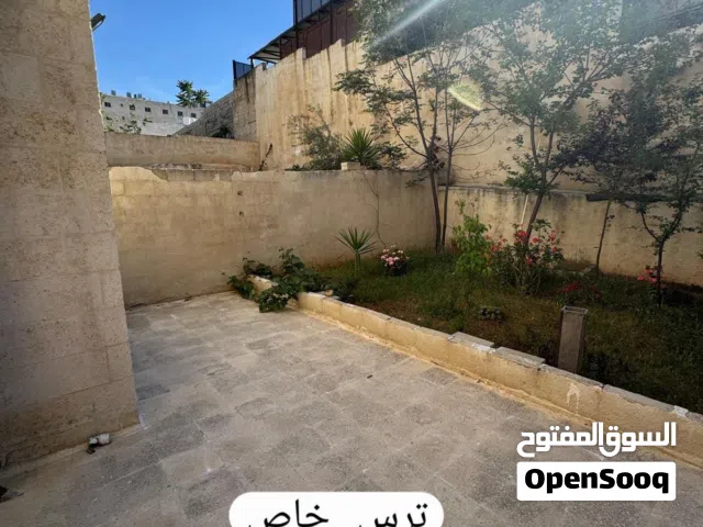 شقة ارضية خلفية داخلي 115م و خارجي 60م حديقة و ترس ضاحية الرشيد قرب ام زويتينة خلف ابو سويلم