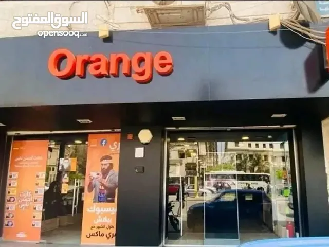 محل تجاري متاجر للبيع بعائد فوري 900 ألف - علي الشارع الرئيسي