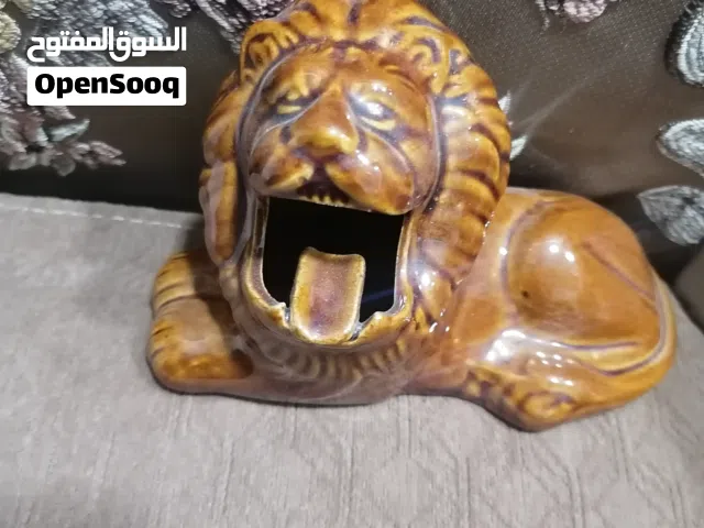 مجسم اسد صيني مستعمل بحاله جيده جدا