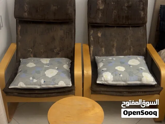 Two comfortable chairs with pillow, and small coffee table from IKEA