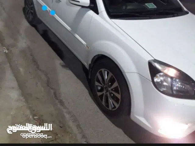 كيا ريو أبيض مديل 12 بسمي