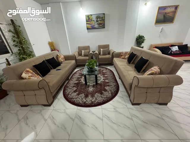 sofa chair computer table tea table carpet