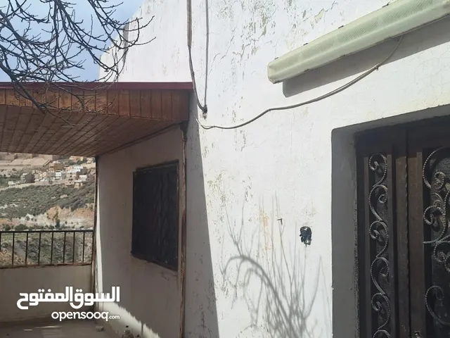 125 m2 5 Bedrooms Townhouse for Sale in Al Karak Al-Marj