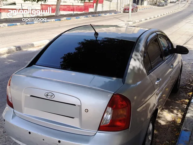 هونداي فيرنا 2006 مع كامل الإضافات  (شاشة لمس، كاميرا خلفية، شبابيك كهربا...)