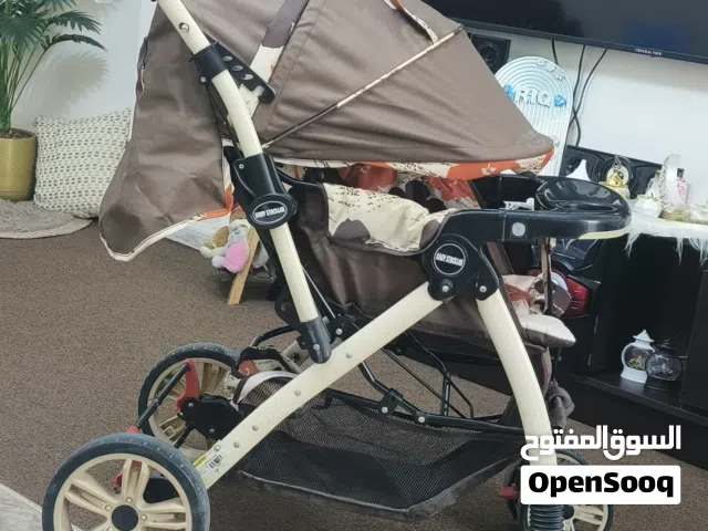 عرباية و كرسي طعام وكراجة وكوت
