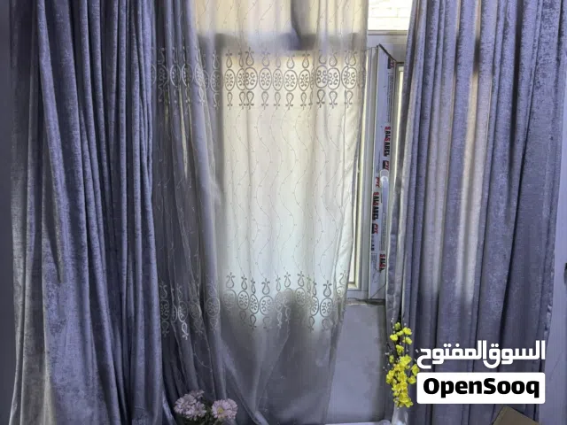 بردات باللون الرصاصي والبني الفاتح القياسات في الوصف