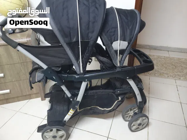 عربة اطفال ماركة كارجو بكرسيين trolley for tow kids from GRACO