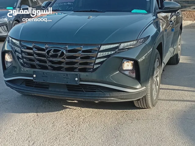Hyundai Tucson hybrid 2021 هيونداي توسان هايبرد 2021 . وارد كوريا الجنوبية . فحص 7 جيد -