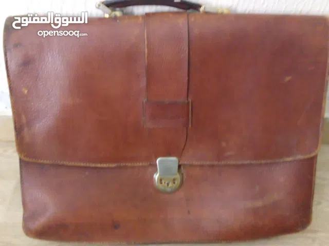 شنطة جلد أصلى طبيعى مية فى المية