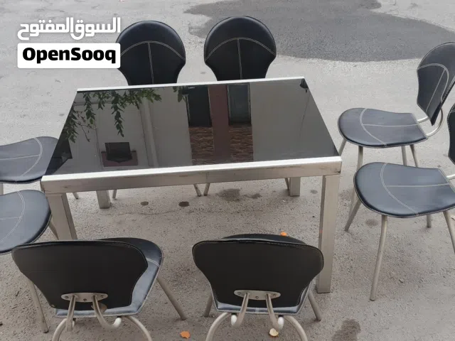 طاولات طعام طاوله مع 8كراسي الون اسود بحاله ممتاز