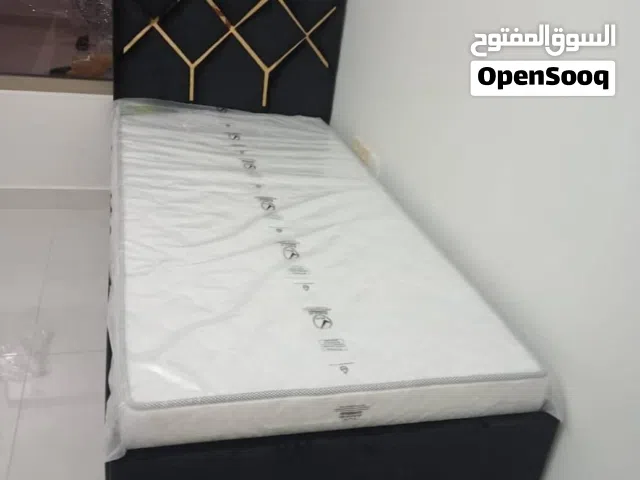 Single bed frame with medical mattress for sale
