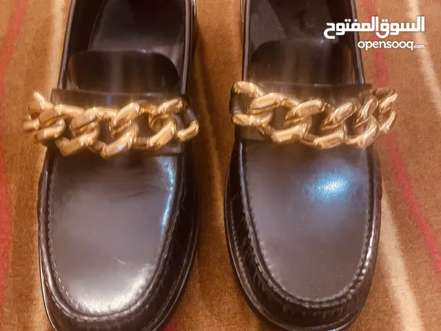 Versace loafers with gold chain