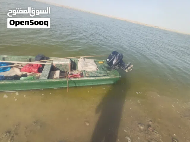 زورق فيبر طول 6 متر عرض 150 مع مكينه 18 توهاتسو بلم نظيف و خفيف جدا . بصره . شط العرب