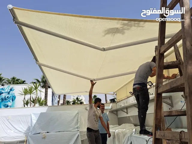 مظلة متحركة للمحلات او المنازل