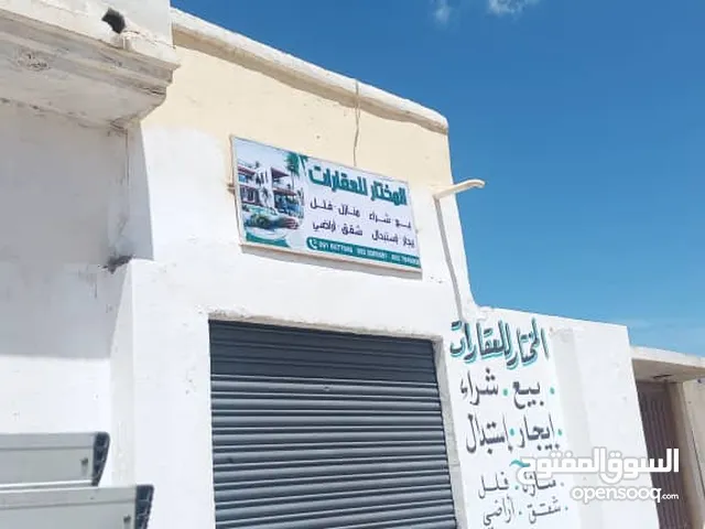 كزيوني عمارة تجارية واجهتين عالرئيسي