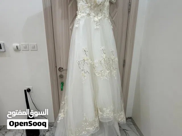 فستان زفاف اوف وايت