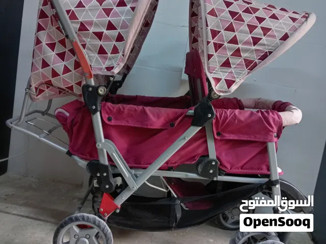 عربة اطفال ثنائية