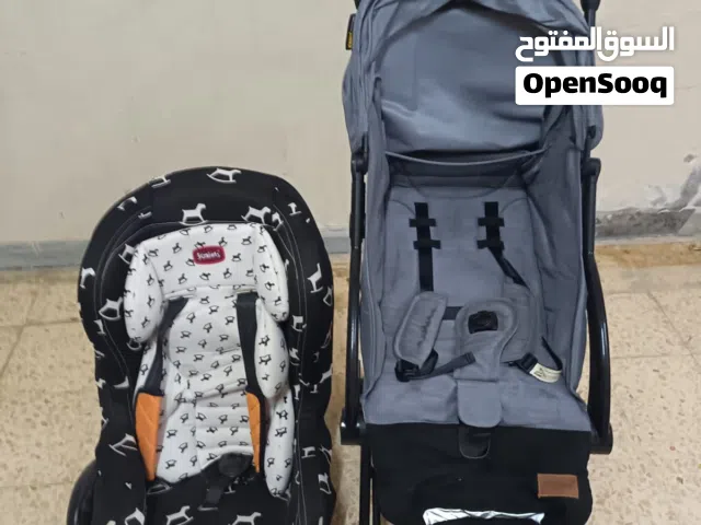 كرسي سياره وعربيه اطفال بحالة الزيرو